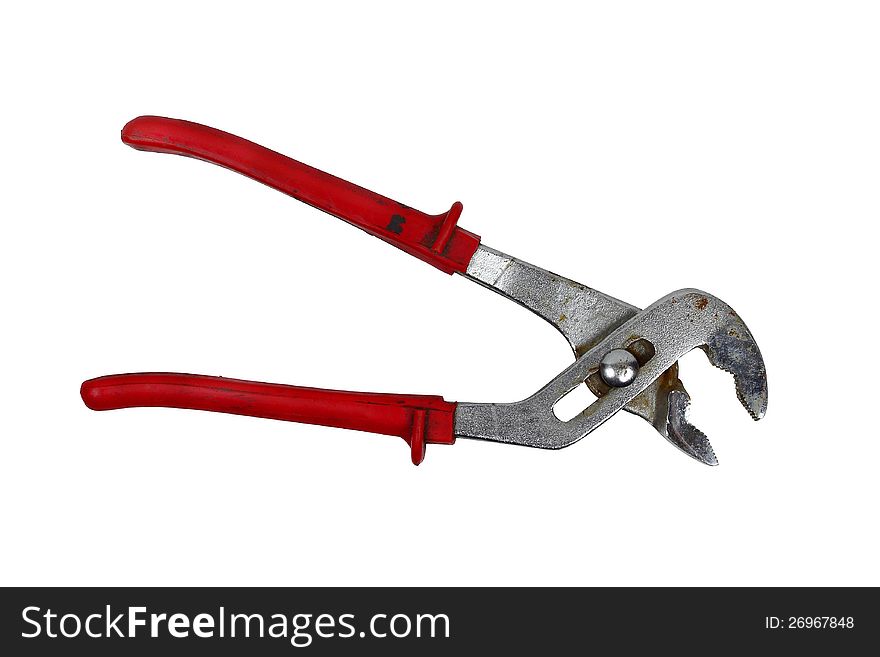 Rusty metallic wrench pliers with red handles isolated on white. Rusty metallic wrench pliers with red handles isolated on white