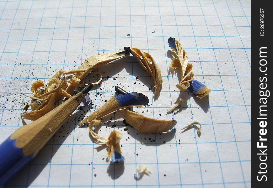 The image of grinded pencil and sawdust from it. The image of grinded pencil and sawdust from it