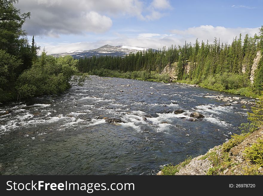 Rapid stream among rocks, Ural, northern Russia. Rapid stream among rocks, Ural, northern Russia