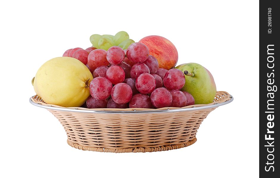 Assorted fruits on a saucer isolated on white