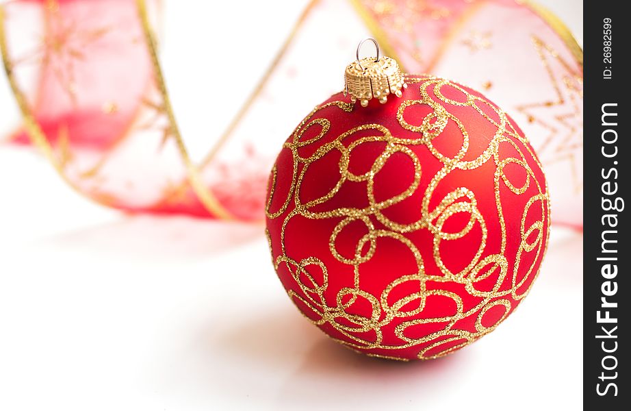 Red Christmas bauble on a white background