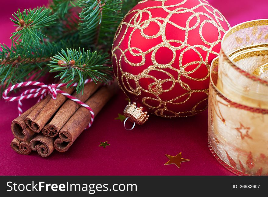 Christmas decoration with  cinnamon and Christmas bauble