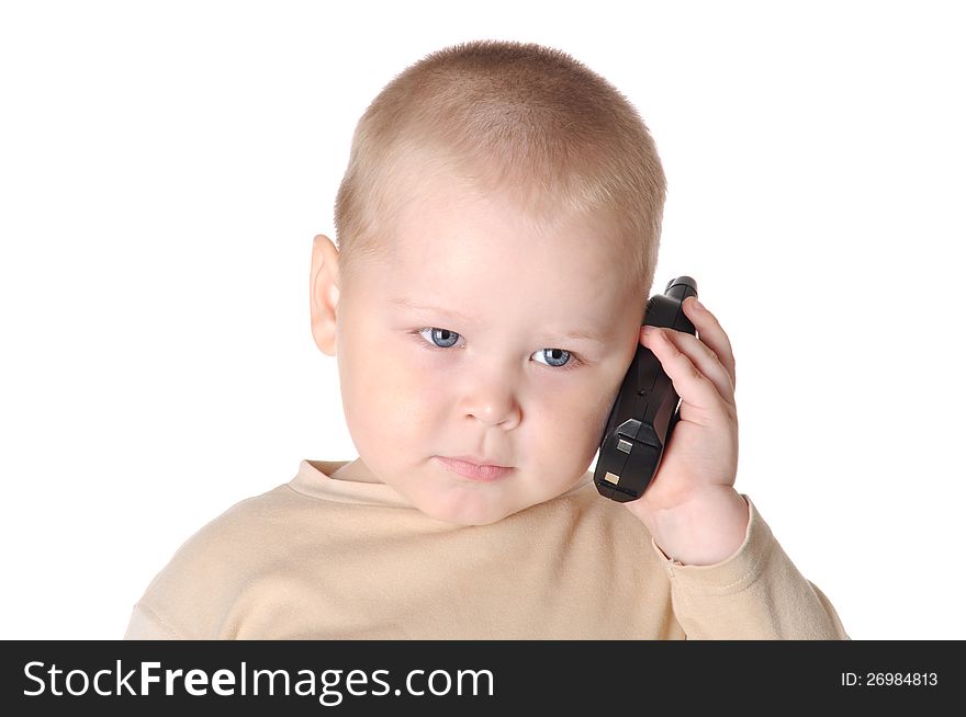 Small boy talking on the phone, isolated on white background. Small boy talking on the phone, isolated on white background