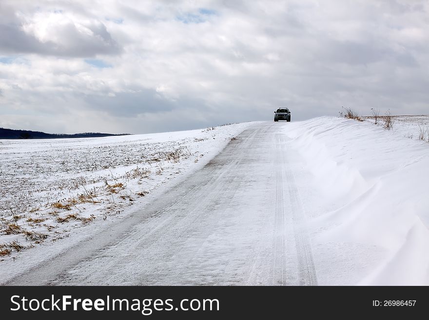 Snow blowing across a road in rural Pennsylvania. Snow blowing across a road in rural Pennsylvania.