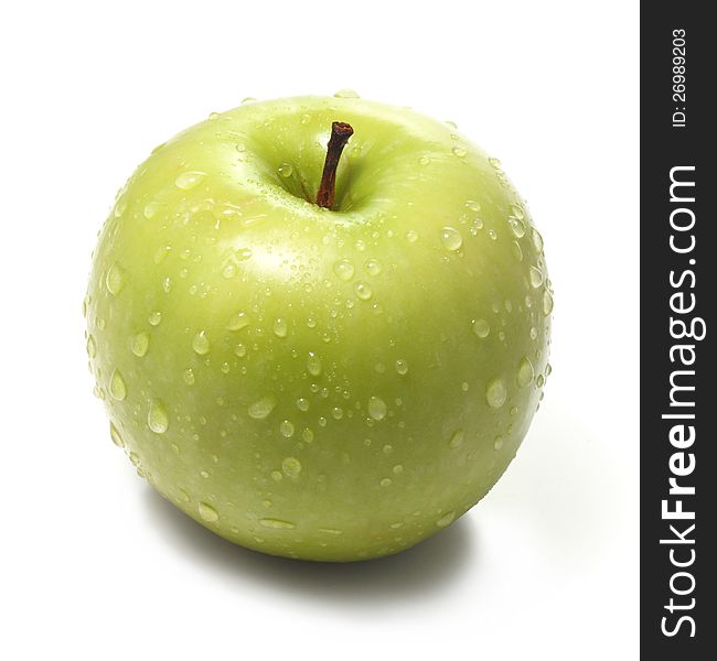 Fresh juicy green apple isolated on a white background.