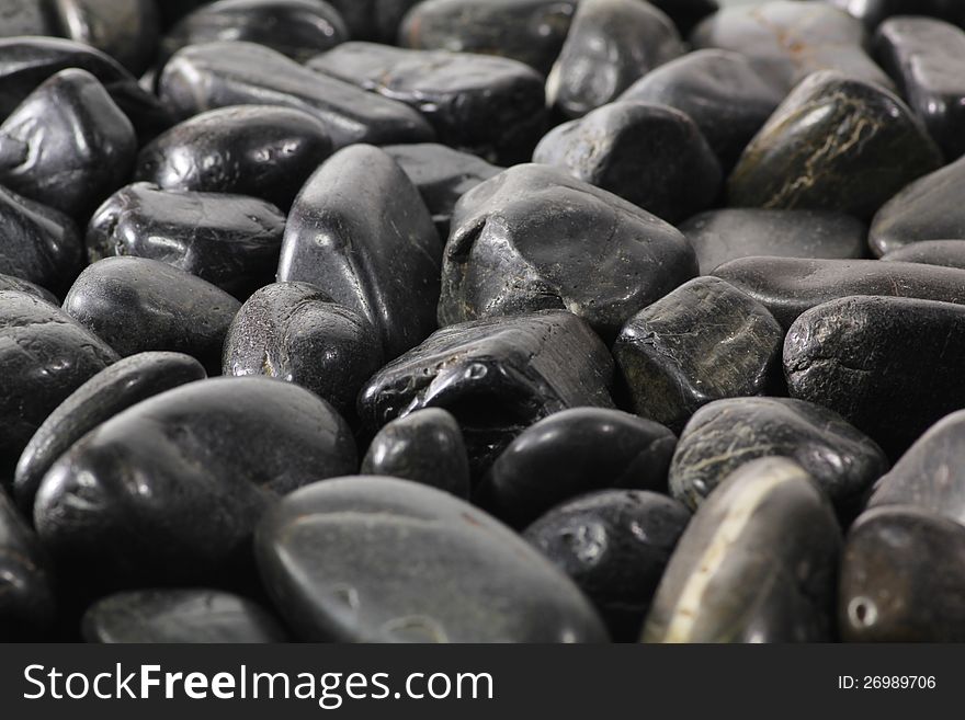 A background with black stones