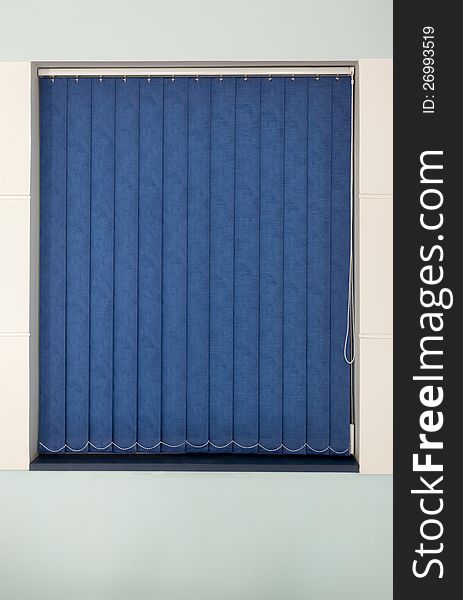 Texture of vertical blue jalousie on window frame. Texture of vertical blue jalousie on window frame