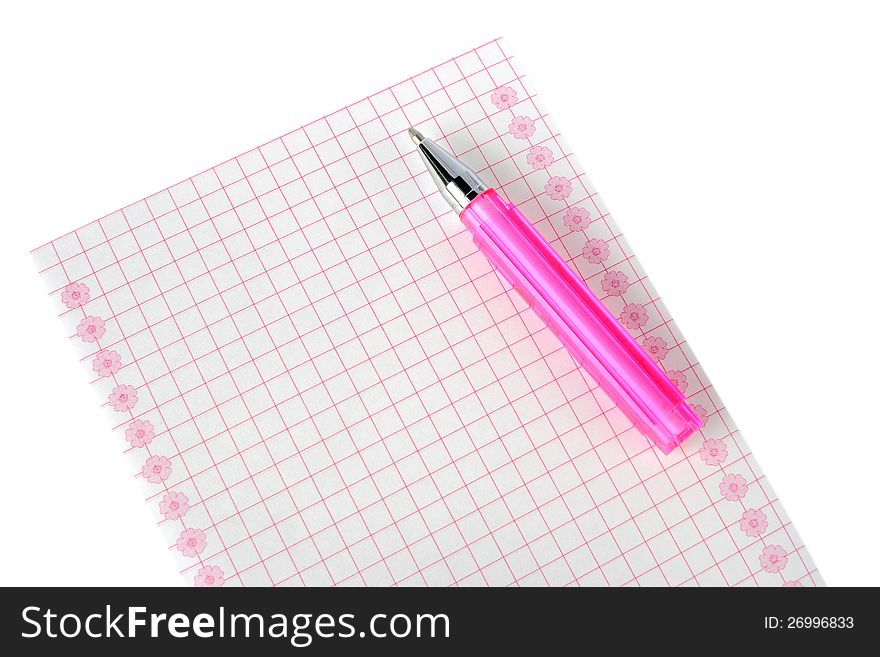 Pen  lies on sheet of paper on a white background