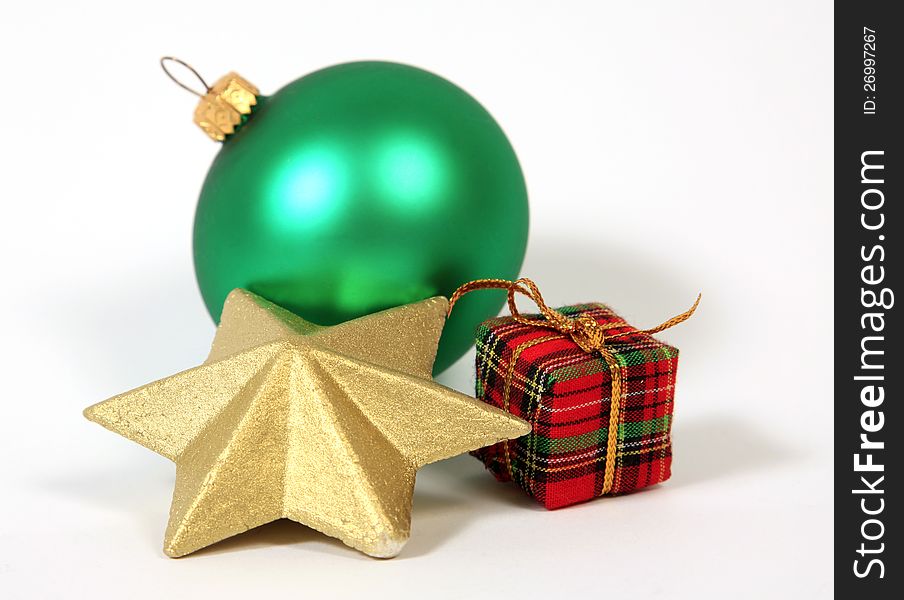 Christmas decoration with the golden star and bauble
