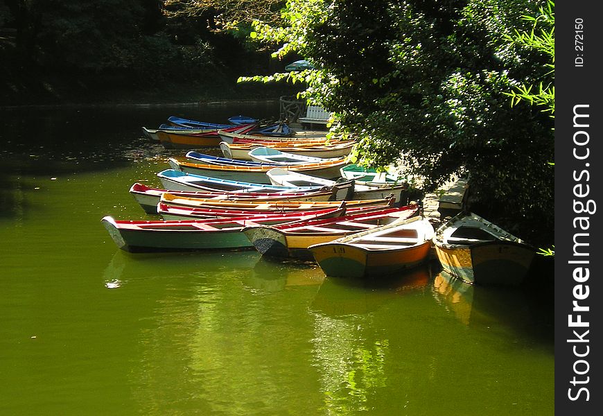 Small Lake On A Park With Boats