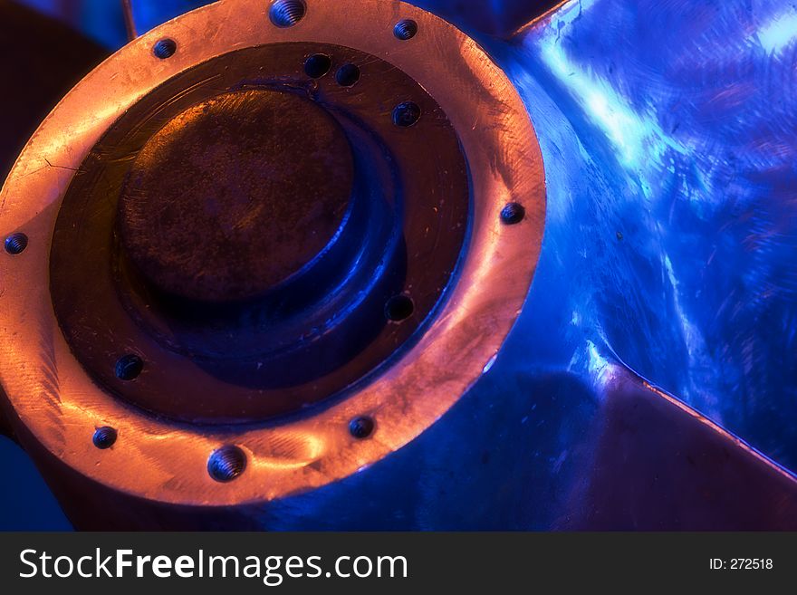 Detail of a propeller illuminated by blue light. Detail of a propeller illuminated by blue light