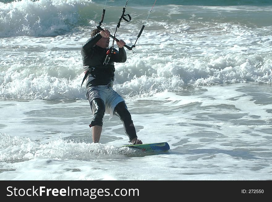 Kitesurfer in the waves. Kitesurfer in the waves