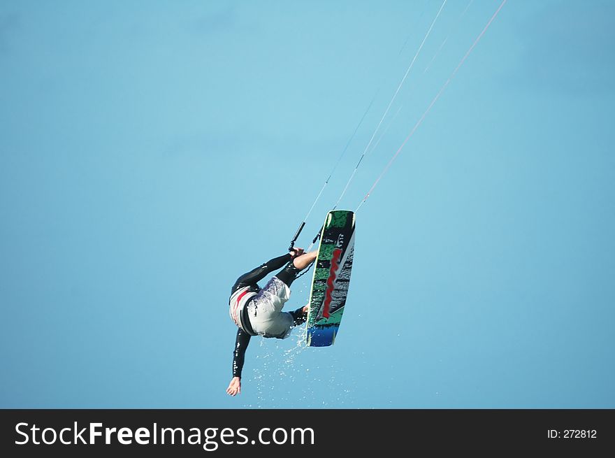 Kite surfer stunt. Kite surfer stunt