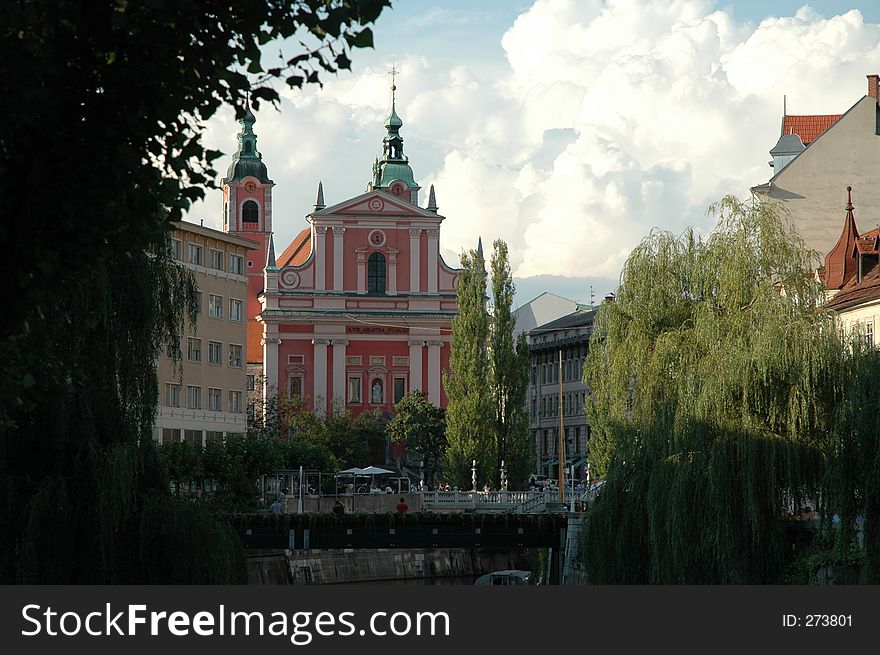 European church and willow trees. European church and willow trees