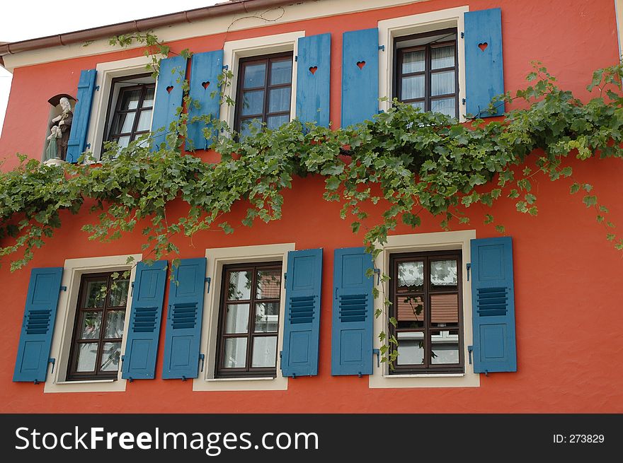 Windows with shutters and ivy in Hambach, Germany. Windows with shutters and ivy in Hambach, Germany