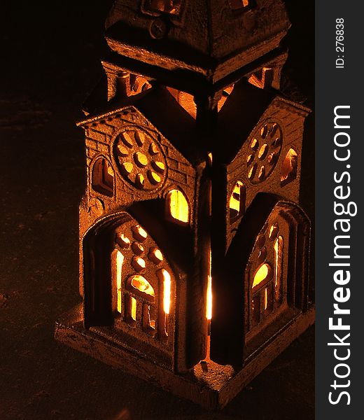 Close up on a spooky, rusted candle lantern. Close up on a spooky, rusted candle lantern.