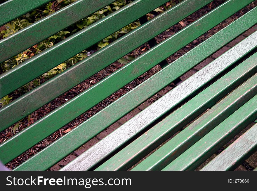 Closeup of Green Wooden Slats on a Park Bench. Closeup of Green Wooden Slats on a Park Bench