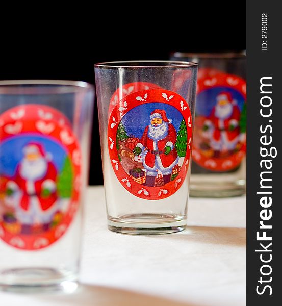 Christmas glasses tthree in a row with focus on center glass