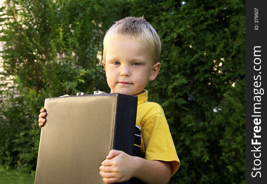 Boy and briefcase. Boy and briefcase