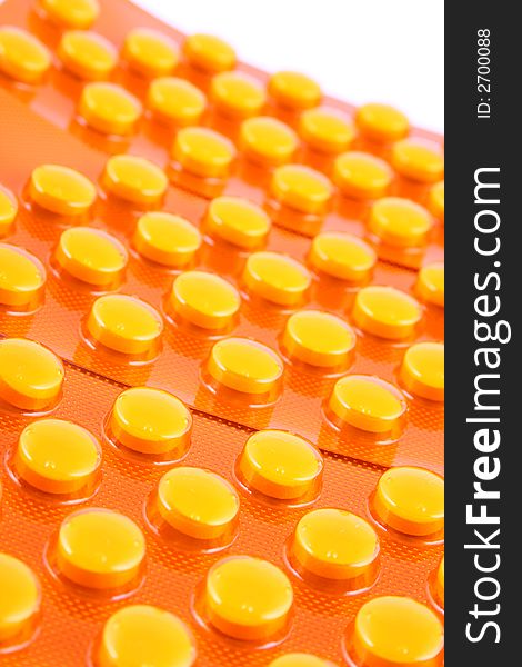 Tablets and vitamin pills in different shapes and colors. Tablets and vitamin pills in different shapes and colors