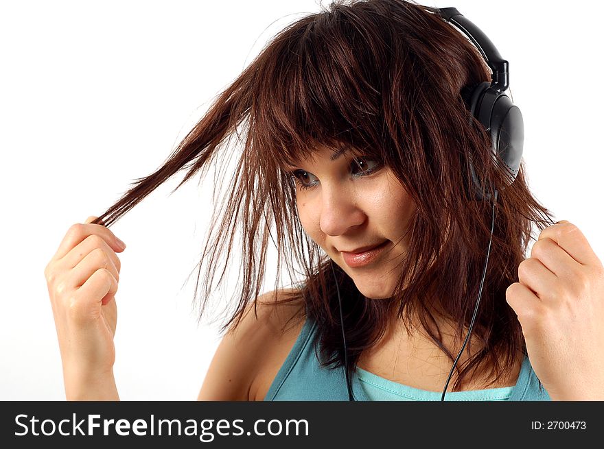 Attractive woman lying with headphones on white background. Attractive woman lying with headphones on white background