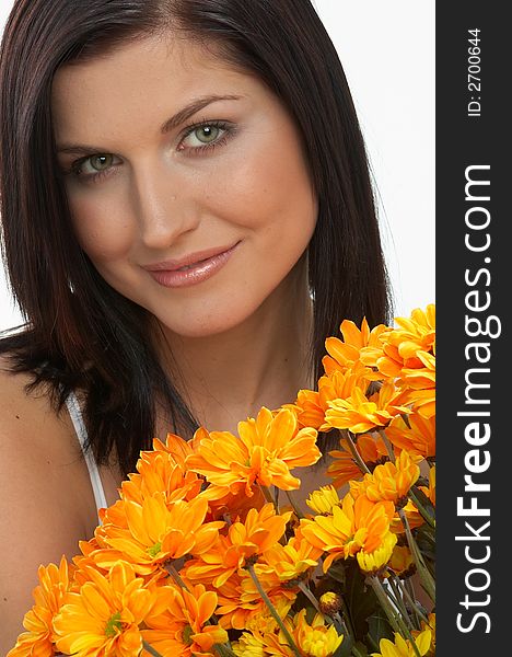 Pretty woman with orange flowers