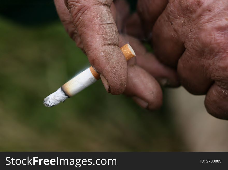 Cigarette In Hand