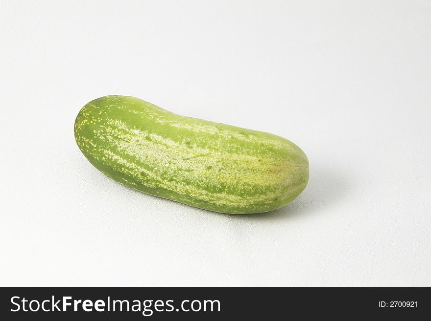 Fresh green cucumber over white background