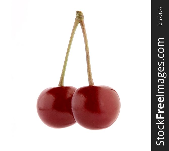 Two fruits of a fruit tree - a cherry. Two fruits of a fruit tree - a cherry