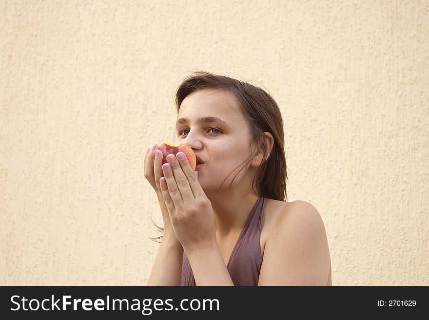 Girl Eating Big Peach