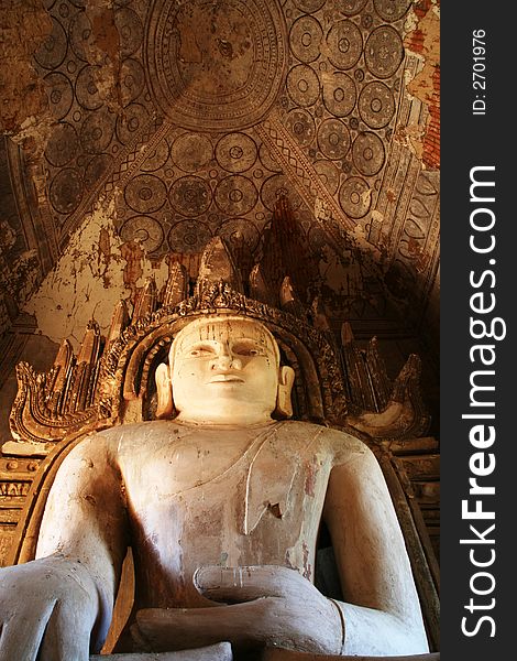 Big Buddha in ancient temple (Bagan, Myanmar)