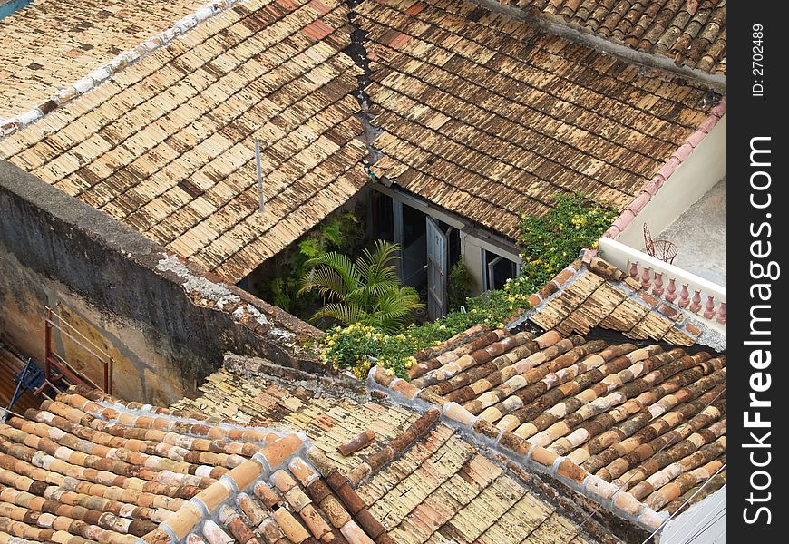 A small patio amid the roof tiles of Trinidad, Cuba. A small patio amid the roof tiles of Trinidad, Cuba