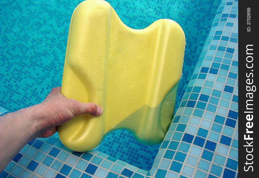 Hand Take Board Out Of Water