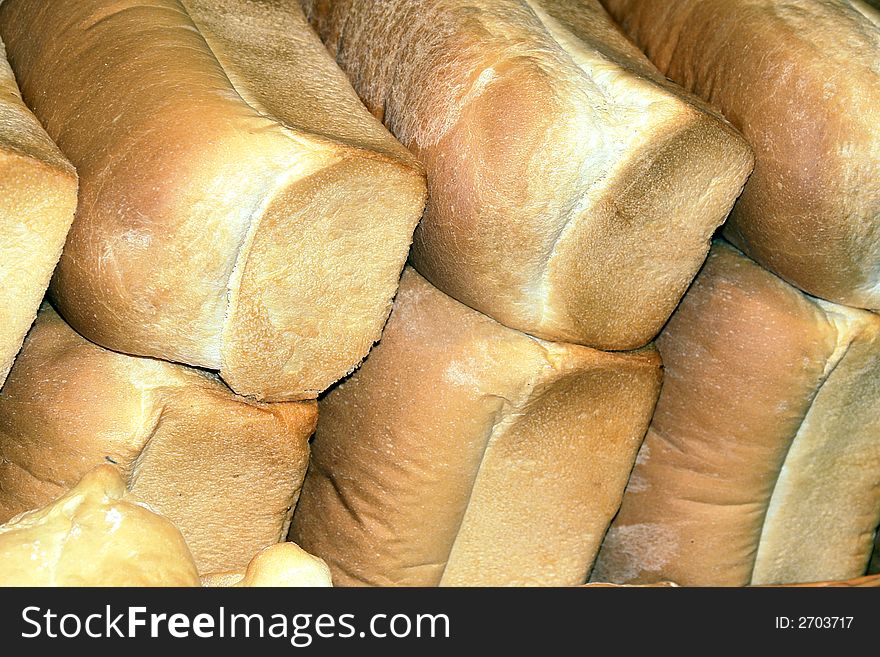 Loaves of fresh baked bread at an indoor market in Vancouver, BC. Loaves of fresh baked bread at an indoor market in Vancouver, BC