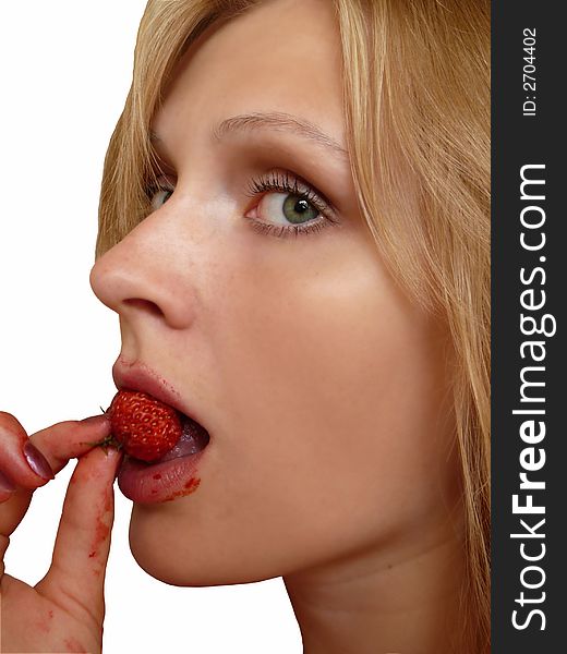 Young beautiful blond eating red strawberry, on white background. Young beautiful blond eating red strawberry, on white background