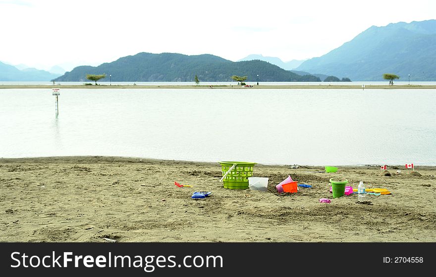 Sand toys on the beach at Harrison Hot Springs, BC. Sand toys on the beach at Harrison Hot Springs, BC