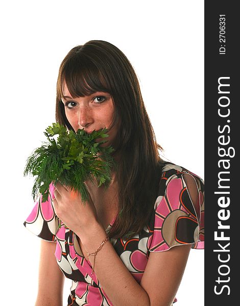 Girl with a parsley and fennel on a white background