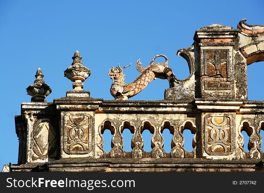 Dragon on the roof of old temple in Bagan (Myanmar)