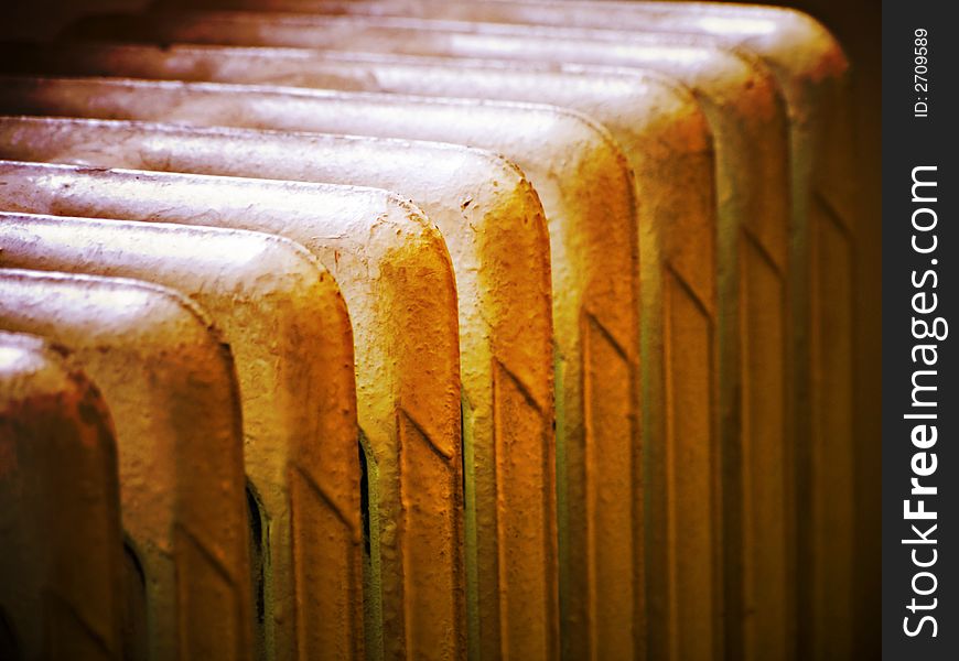 Close up of radiator in warming tones and highlights. Close up of radiator in warming tones and highlights