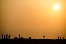 Silhouette Of People At Sunset Royalty Free Stock Photography
