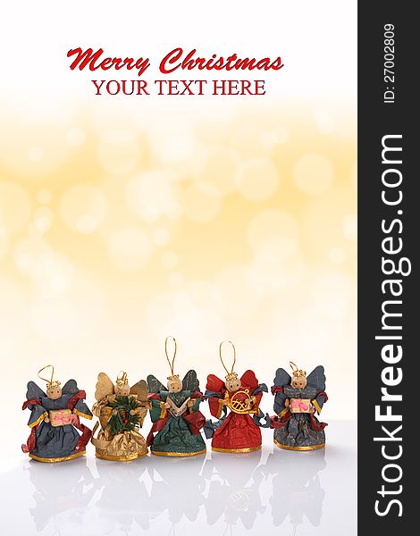 Decorative christmas card with  angels and golden bokeh effect.