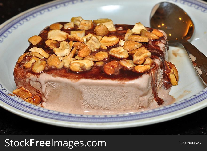 Chocolate dry fruit Ice cream:An Ice cream sundae with nuts from southern state of Karnataka from India. Chocolate dry fruit Ice cream:An Ice cream sundae with nuts from southern state of Karnataka from India.