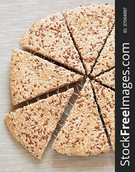 Flax seeds and sesame flat bread, selective focus