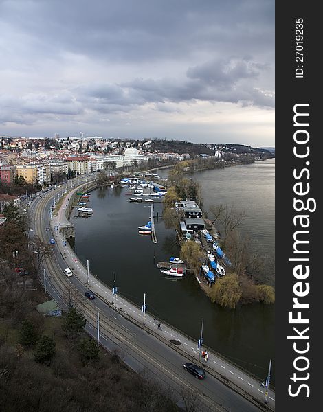 View from the top of the vltava river, barges and boats moored on the river vltava, road running along the river bank. View from the top of the vltava river, barges and boats moored on the river vltava, road running along the river bank