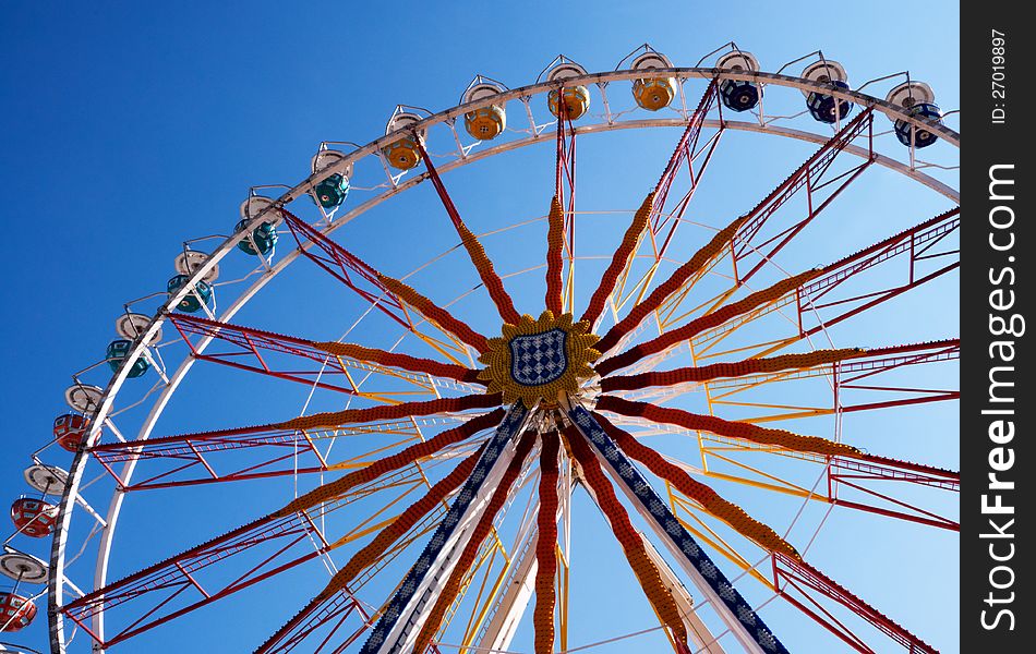 Ferris Wheel horizontal shot with blue sky