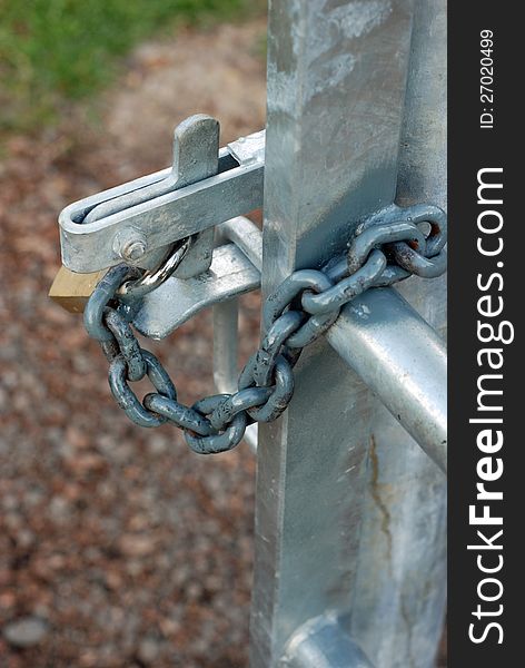 New gate to public playing field showing latch, chain and padlock. This was padlocked open so the gate couldn't be closed for a public event. New gate to public playing field showing latch, chain and padlock. This was padlocked open so the gate couldn't be closed for a public event.