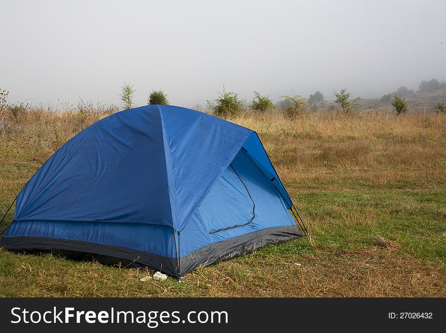 Tent set up for camping in the mountains. Tent set up for camping in the mountains.