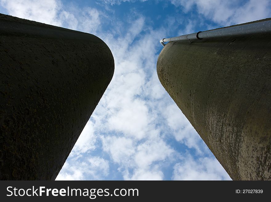 Agriculture farm grain silos in vertical angle facing the sky