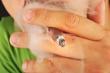 Close Up Of Cigarette Smoking Royalty Free Stock Photo