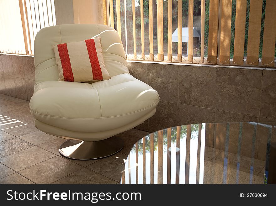White relaxing chair in office lobby. White relaxing chair in office lobby